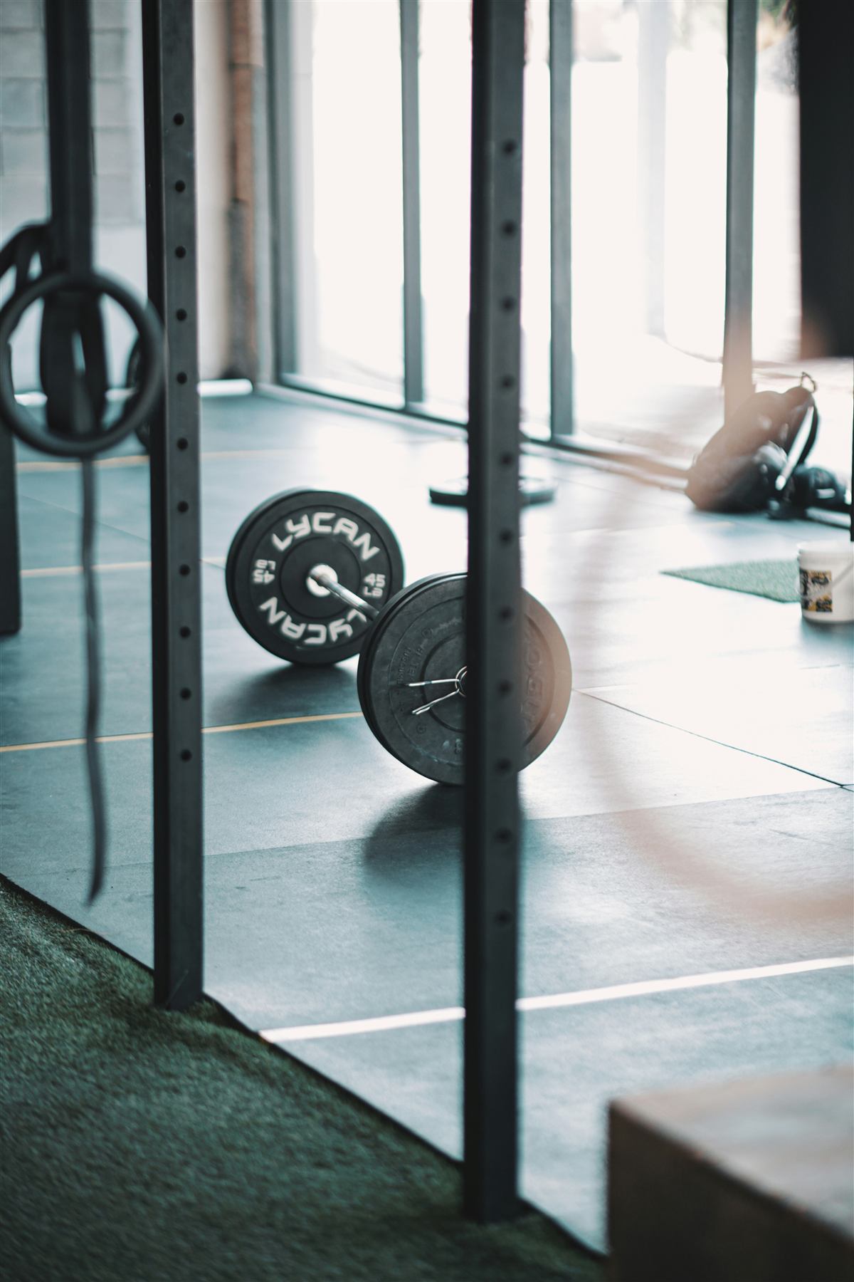 Bumper plates and rack detail at Chaos Fitness