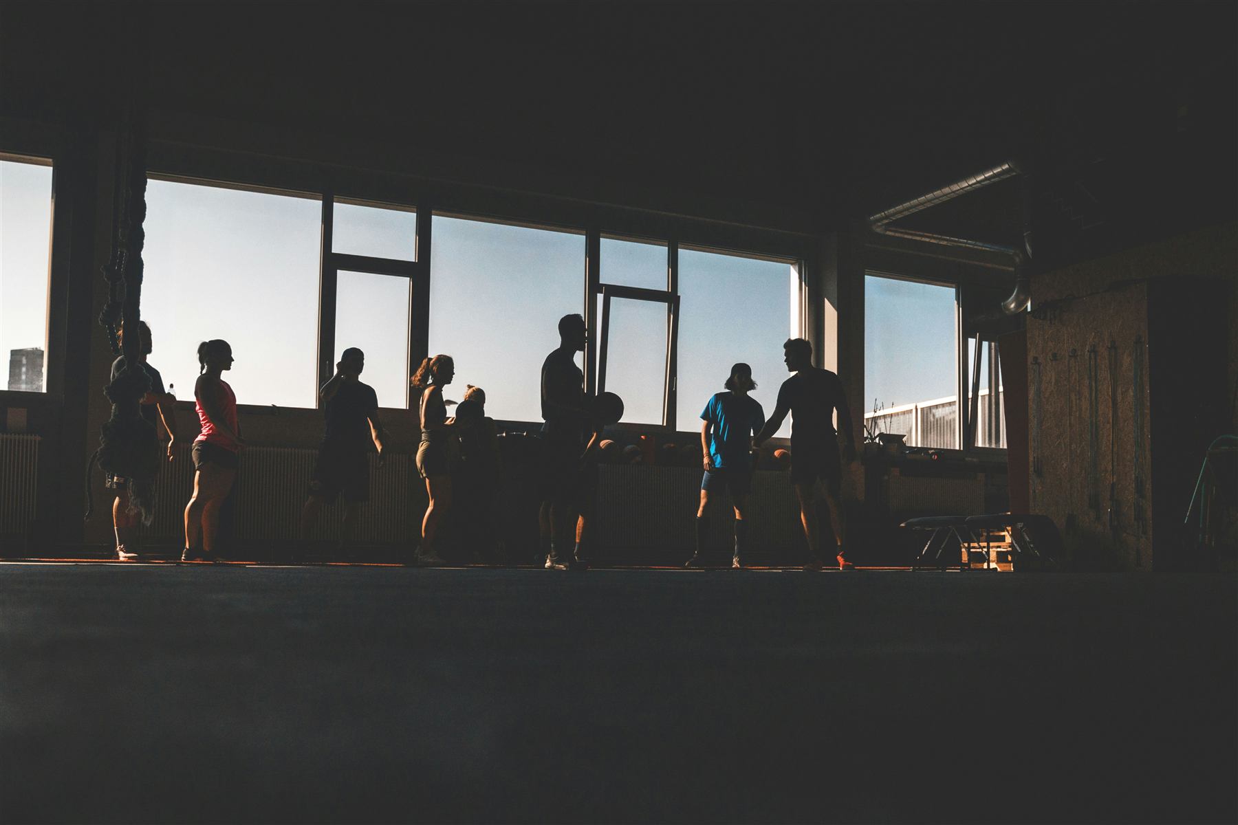 Sunrise group class silhouette at Chaos Fitness